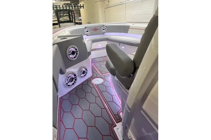 Slide: The Image of Interior of 2025 Fountain 34 SC boat with modern seating and stylish lighting. - 18