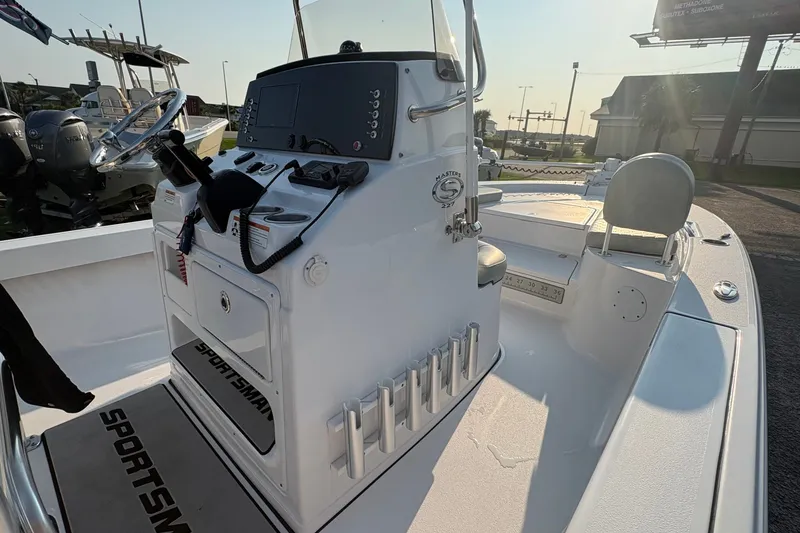 Slide: The Image of 2019 Sportsman Masters 227 Bay Boat cockpit with steering console and seating. - 16