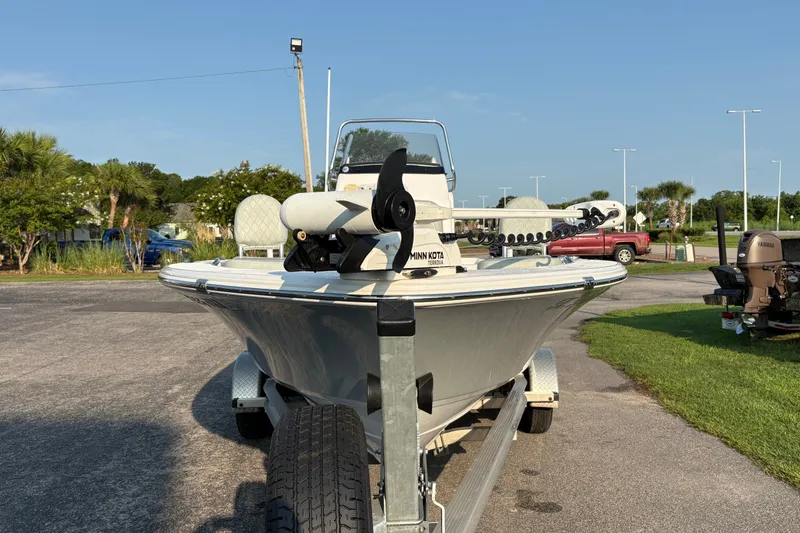 Slide: The Image of 2019 Sportsman Masters 227 Bay Boat on trailer, parked outdoors. - 6