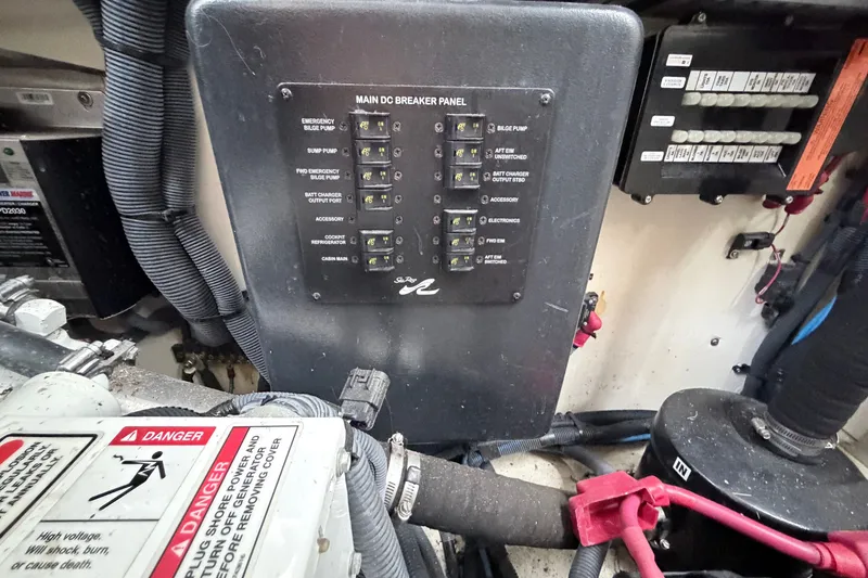 Slide: The Image of Electrical breaker panel on a 2006 Sea Ray Sundancer 320 boat. - 40