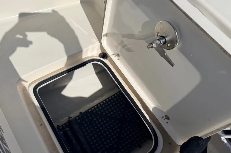 Slide: The Image of Open storage compartment on a 2015 Pathfinder 2200 Tournament Edition boat. - 36