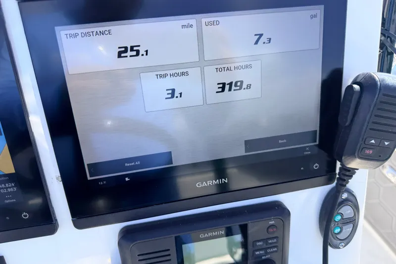 Slide: The Image of Garmin display showing trip data: 25.1 miles, 7.3 gallons used, 3.1 trip hours. - 50
