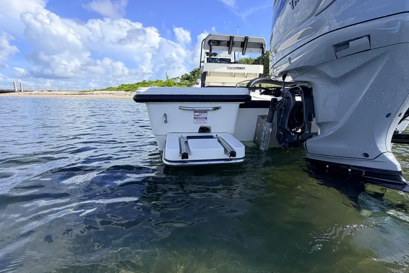 Slide: The Image of 2015 Pathfinder 2200 Tournament Edition boat with ladder in shallow water. - 21