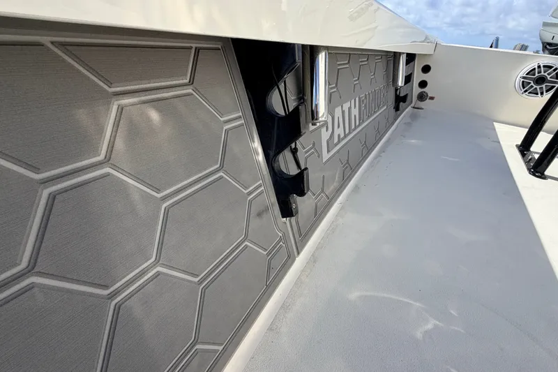 Slide: The Image of 2015 Pathfinder 2200 Tournament Edition boat interior with hexagonal pattern design. - 43