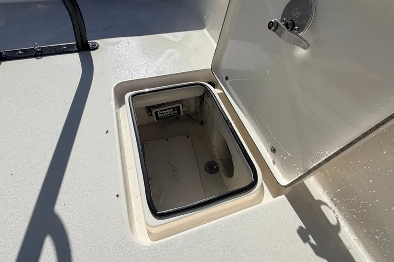 Slide: The Image of Open storage compartment on 2015 Pathfinder 2200 Tournament Edition boat. - 29