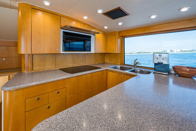 Slide: The Image of Luxurious kitchen interior of 1998 Buddy Davis 58 Sportfisherman yacht with ocean view. - 16
