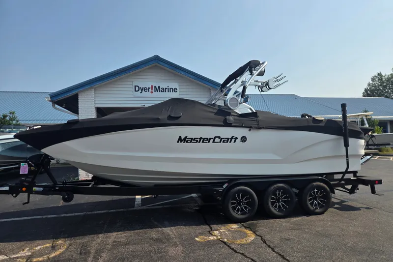 The Image of 2021 MasterCraft X24 boat on trailer at Dyer Marine dealership. - 0