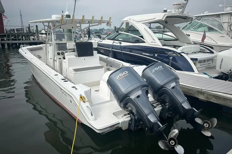 Slide: The Image of 2008 Jefferson Marlago 35 boat docked with twin 250 horsepower engines. - 1