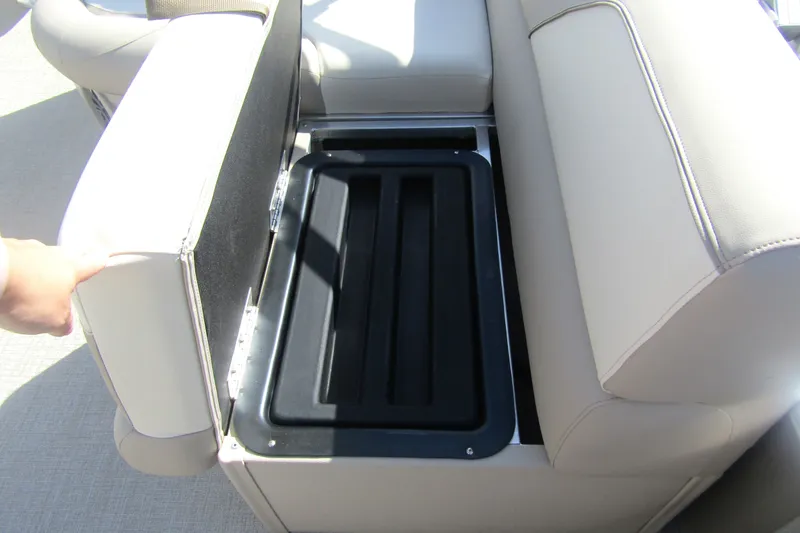 Slide: The Image of 2026 Tahoe Pontoon Sport 85 Rear Fish 21 seat storage compartment open. - 21