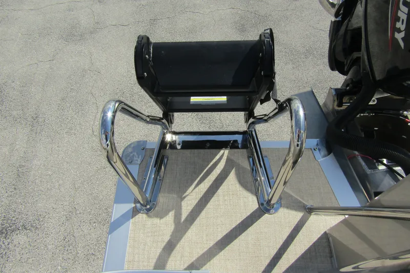 Slide: The Image of 2026 Tahoe Pontoon Sport 85 Rear Fish 21 boat ladder and motor detail. - 28