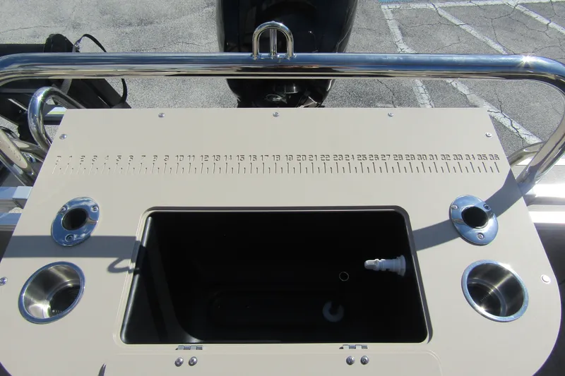 Slide: The Image of 2026 Tahoe Pontoon Sport 85 Rear Fish 21 fishing station with built-in ruler and rod holders. - 27