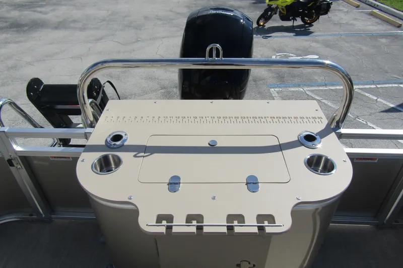 Slide: The Image of 2026 Tahoe Pontoon Sport 85 Rear Fish 21 with fishing station and cup holders. - 26