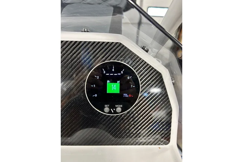 Slide: The Image of Dashboard of 2026 Highfield Sport 420 boat with carbon fiber finish and digital display. - 16