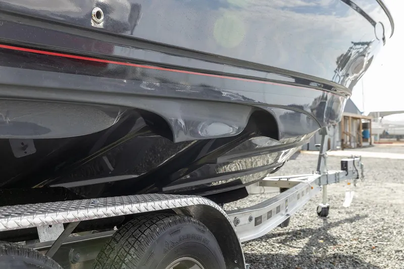 Slide: The Image of Manufacturer Provided Image: 2025 Solara S-250 CW boat on trailer, close-up view. - 4