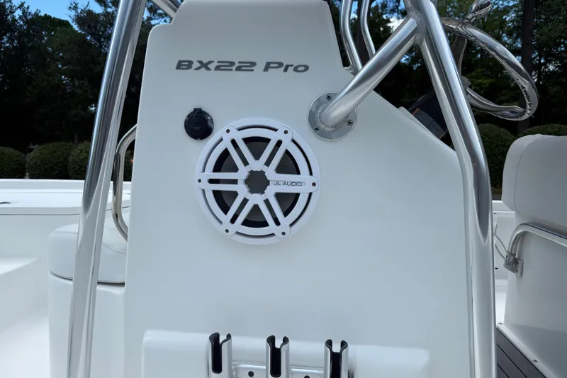Slide: The Image of 2015 Sea Hunt BX22 Pro boat console with JL Audio speaker and stainless steel railings. - 18