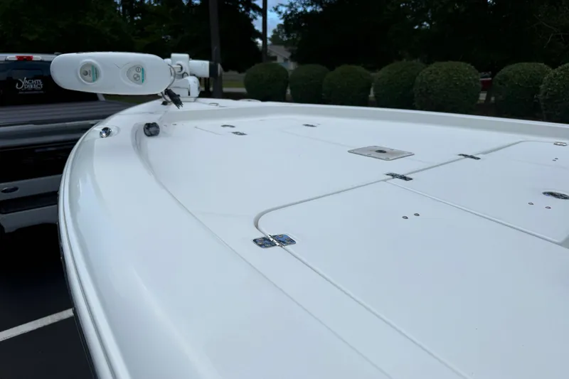 Slide: The Image of 2015 Sea Hunt BX22 Pro boat deck with mounted equipment, outdoors. - 20