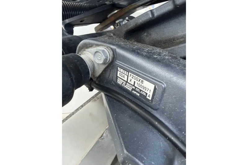 Slide: The Image of Close-up of Yamaha F200X8 engine part on 2015 Sea Hunt BX22 Pro boat. - 34