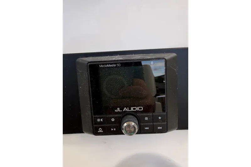 Slide: The Image of JL Audio MediaMaster 50 on 2015 Sea Hunt BX22 Pro boat dashboard. - 28