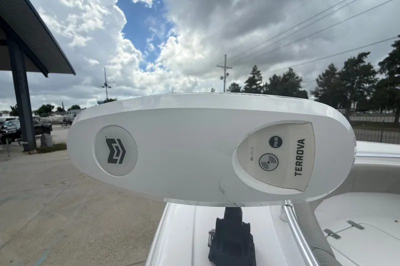 Slide: The Image of 2024 Sportsman Heritage 231 Center Console with Terrova trolling motor detail. - 15