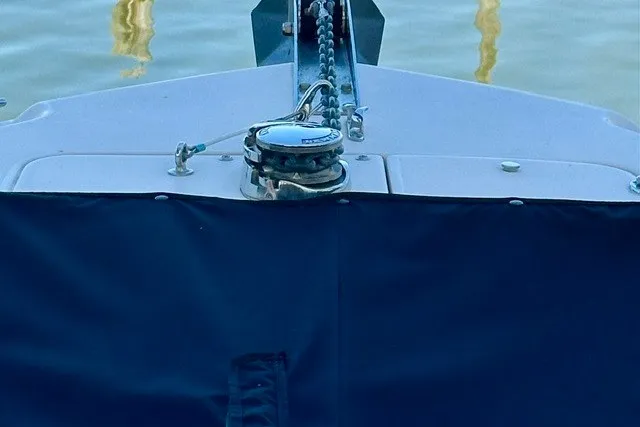 Slide: The Image of Bow of 2015 Grady-White Freedom 255 boat with anchor chain and cover. - 3