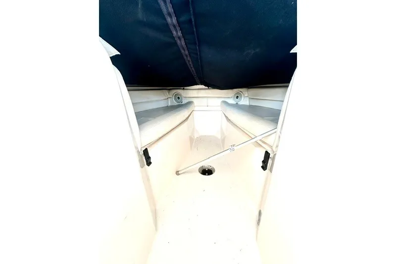 Slide: The Image of 2015 Grady-White Freedom 255 boat interior with seating and canopy. - 4