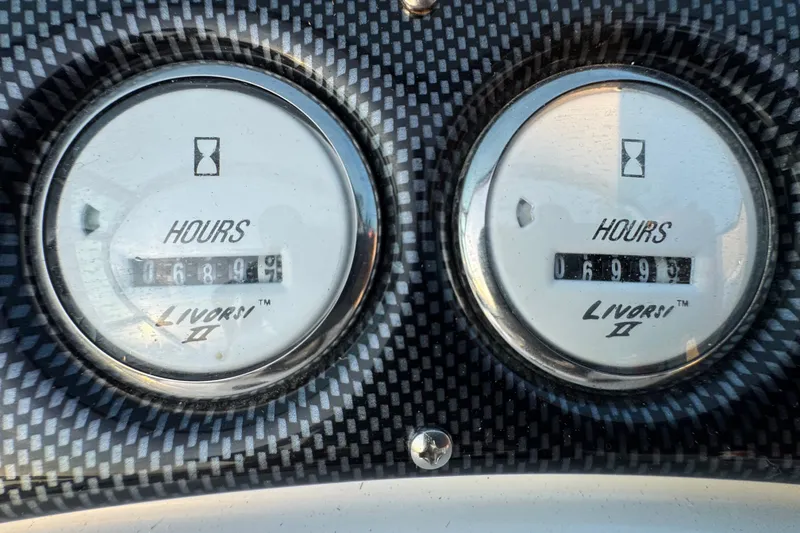 Slide: The Image of Close-up of Livorsi II hour meters on 2008 Envision 3600 Legacy ESP dashboard. - 32
