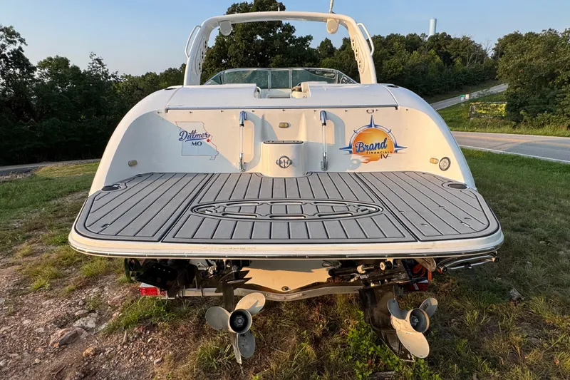 Slide: The Image of Rear view of 2008 Envision 3600 Legacy ESP boat on grassy terrain. - 7