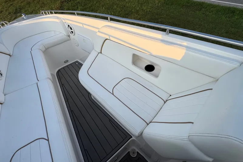 Slide: The Image of Luxurious seating on 2008 Envision 3600 Legacy ESP boat, featuring white upholstery and sleek design. - 23