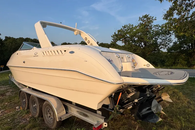 Slide: The Image of 2008 Envision 3600 Legacy ESP boat on trailer, parked outdoors. - 6