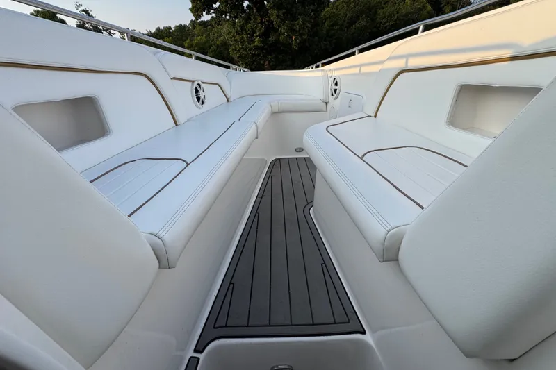 Slide: The Image of Spacious seating area on 2008 Envision 3600 Legacy ESP boat with white upholstery. - 22