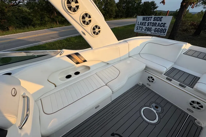 Slide: The Image of Luxurious 2008 Envision 3600 Legacy ESP boat interior with white seating and speaker system. - 9