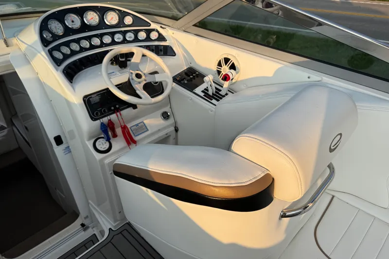 Slide: The Image of Cockpit of 2008 Envision 3600 Legacy ESP boat with steering wheel and control panel. - 11