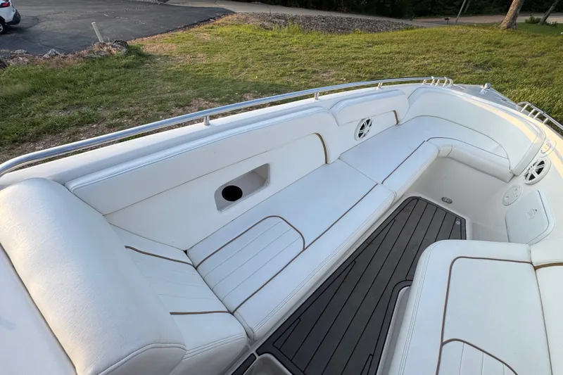Slide: The Image of 2008 Envision 3600 Legacy ESP boat with white seating and sleek deck design. - 24