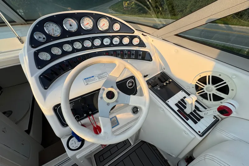 Slide: The Image of Cockpit of 2008 Envision 3600 Legacy ESP boat with gauges and controls. - 13