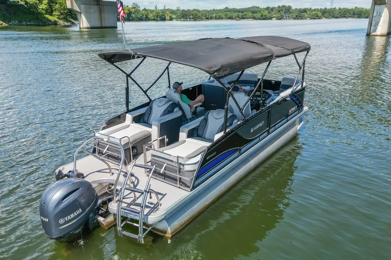 Slide: The Image of 2021 Godfrey Monaco 235 pontoon boat on a scenic river with Yamaha engine. - 5