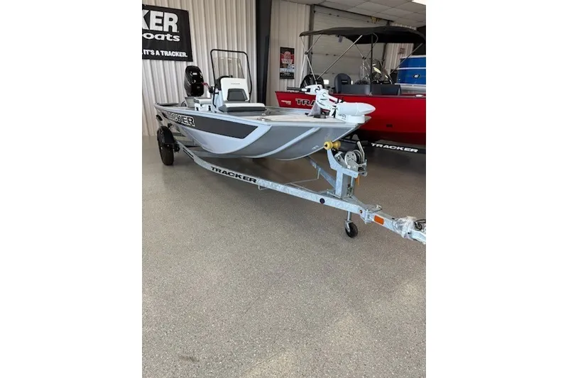 The Image of 2027 Tracker Bass Tracker Classic CC boat on trailer in showroom. - 0