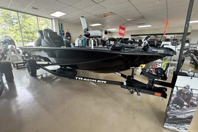 The Image of 2027 Tracker Pro Team 175 TXW Tournament Edition boat displayed in showroom. - 1