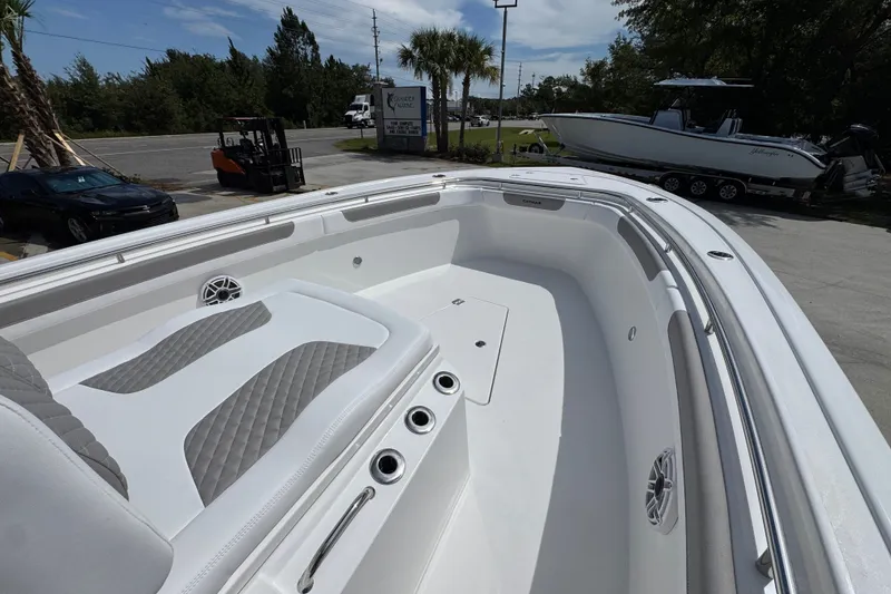 Slide: The Image of 2027 Caymas 291 boat interior with sleek seating and modern design features. - 19