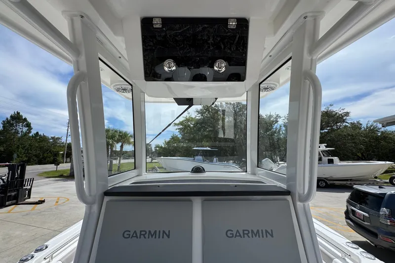 Slide: The Image of Interior view of 2027 Caymas 291 boat featuring Garmin navigation systems. - 34