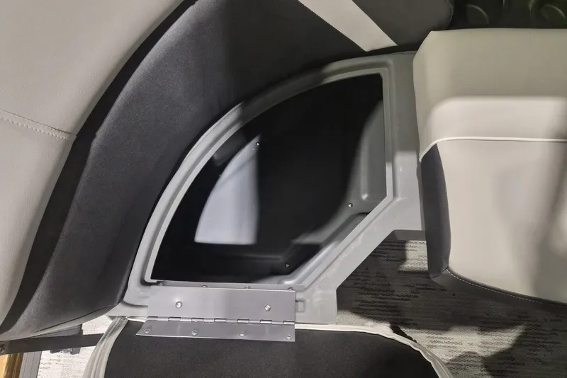 Slide: The Image of Storage compartment in 2026 Sylvan X3 DLZ DH BAR boat interior. - 3