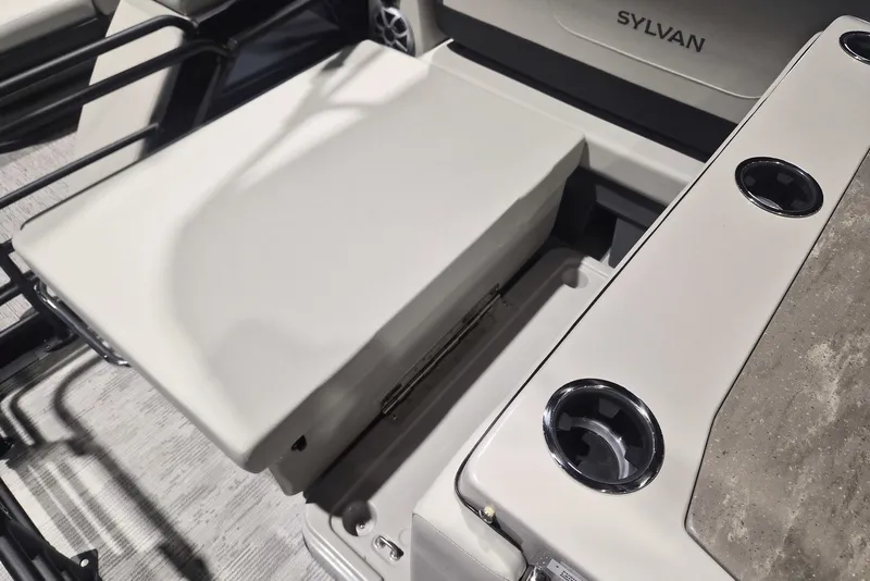 Slide: The Image of Interior of 2026 Sylvan X3 DLZ DH BAR boat with seating and cup holders. - 15
