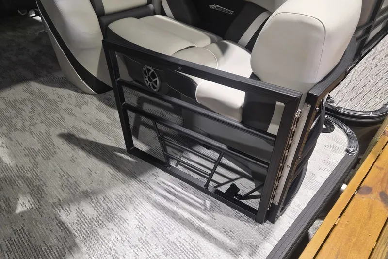 Slide: The Image of Interior of 2026 Sylvan X3 DLZ DH BAR boat with seating and storage compartment. - 1