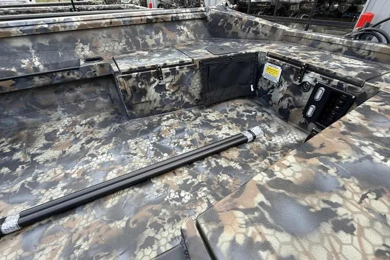 Slide: The Image of Camouflage interior of 2027 Excel 1751 Viper F4 boat, featuring storage compartments. - 3