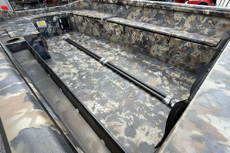 Slide: The Image of Interior of 2027 Excel 1751 Viper F4 boat with camouflage design and seating. - 2