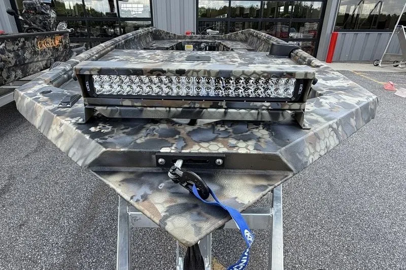 Slide: The Image of Camouflage-patterned 2027 Excel 1751 Viper F4 boat with LED light bar on trailer. - 16