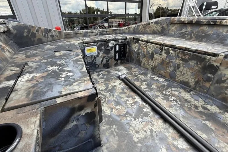 Slide: The Image of Interior of 2027 Excel 1751 Viper F4 boat with camouflage design. - 4