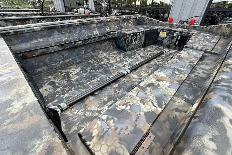 Slide: The Image of Camouflage interior of 2027 Excel 1751 Viper F4 boat, showcasing spacious seating and storage. - 6