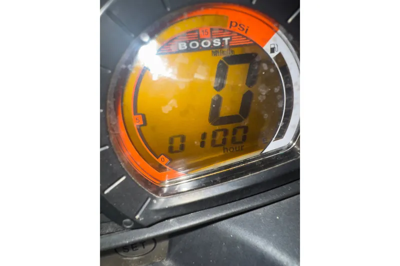 Slide: The Image of Close-up of 2007 Kawasaki Jet Ski Ultra 250X dashboard showing boost gauge and hour meter. - 14