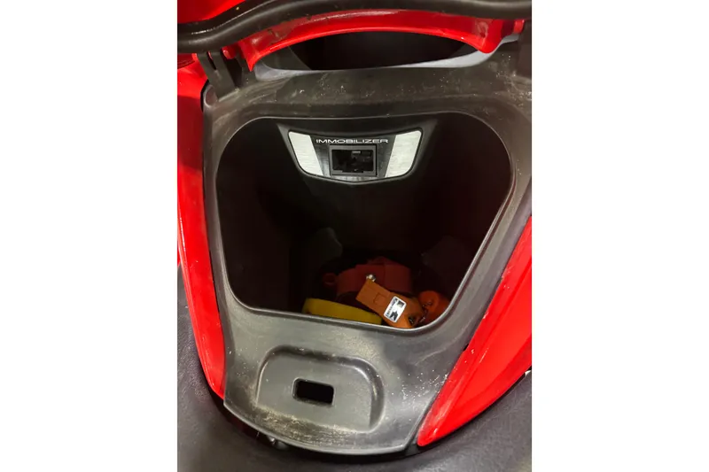 Slide: The Image of Storage compartment of a 2007 Kawasaki Jet Ski Ultra 250X with immobilizer feature. - 11