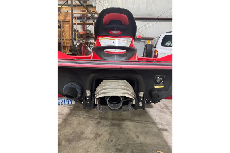Slide: The Image of 2007 Kawasaki Jet Ski Ultra 250X rear view in a garage setting. - 4